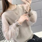 レディース秋用の長袖セーターを着た女性