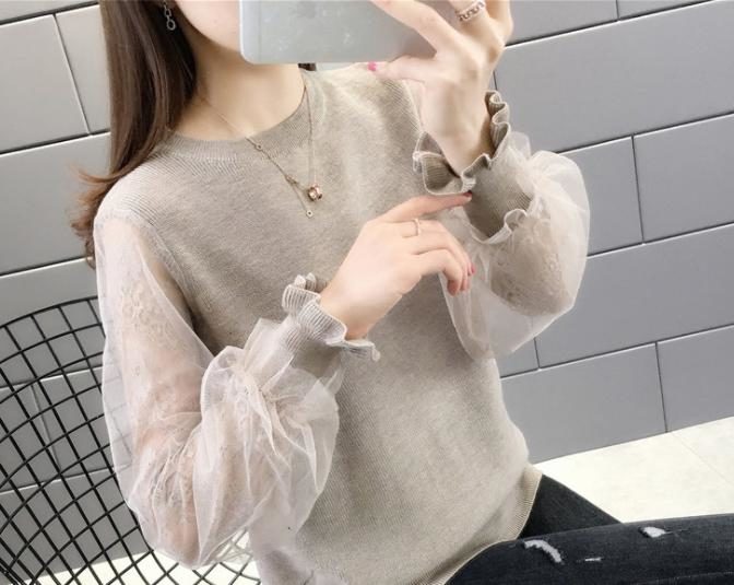 レディース秋用の長袖セーターを着た女性