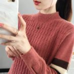 秋・冬用のセーターを着た女性