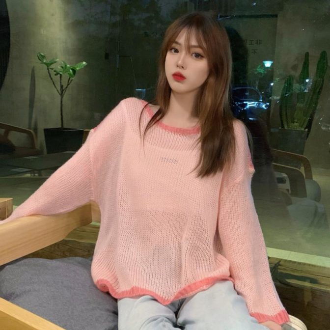 秋用のセーターを着た女性