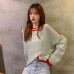 秋用のセーターを着た女性